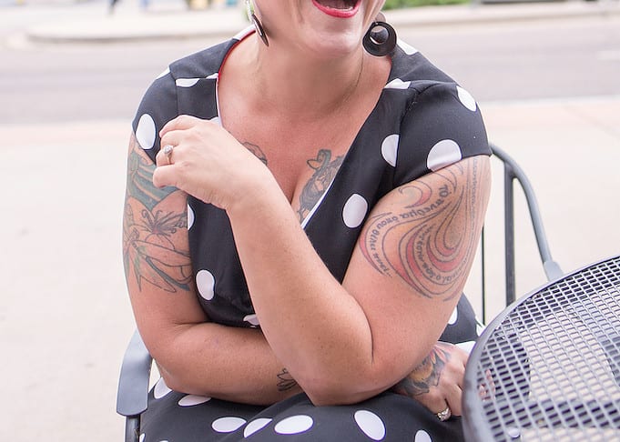 Susan Pieffer, former Poet Laurette of the Pikes Peak Region, laughs from a street side table in downtown Colorado Springs.
