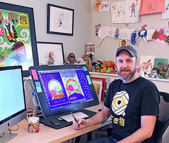 illustrator and author Luke Flowers in his office