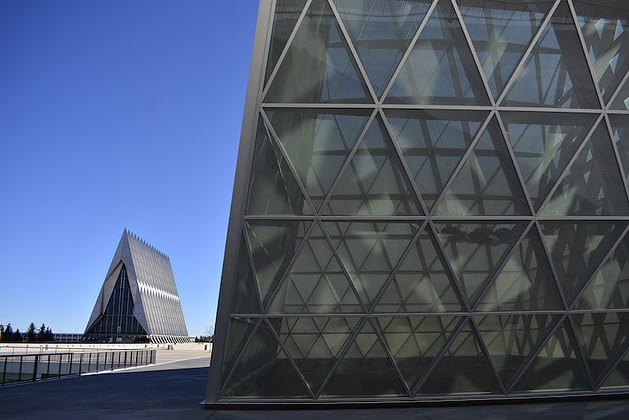 Closeup of geometric structures on the side of a building