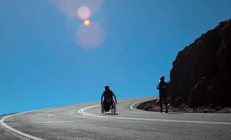 dr. house rolls his wheelchair up pikes peak