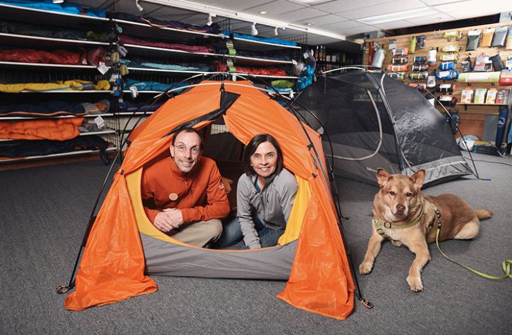 mountain chalet owners jim and plaine smith in tent