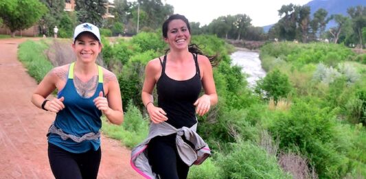 12 Great Running Clubs in Colorado Springs Two girls run in Jack Quinn's Running Club Tuesday