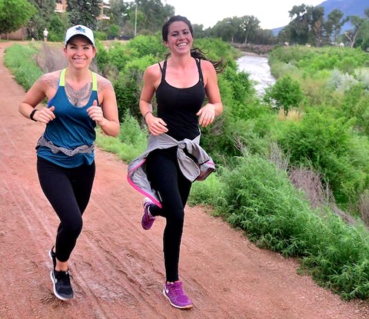 12 Great Running Clubs in Colorado Springs Two girls run in Jack Quinn's Running Club Tuesday
