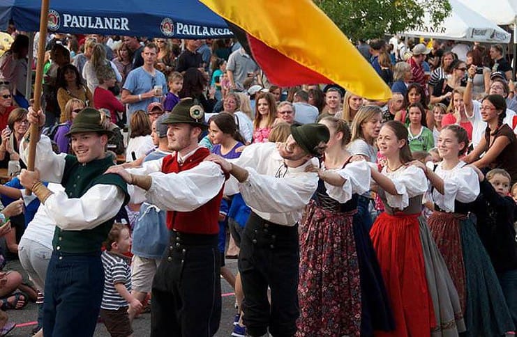 Dancers in a line at the Colorado Springs Oktoberfest