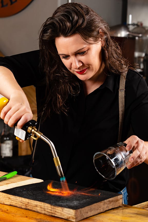montana horsfall uses torch for craft cocktails