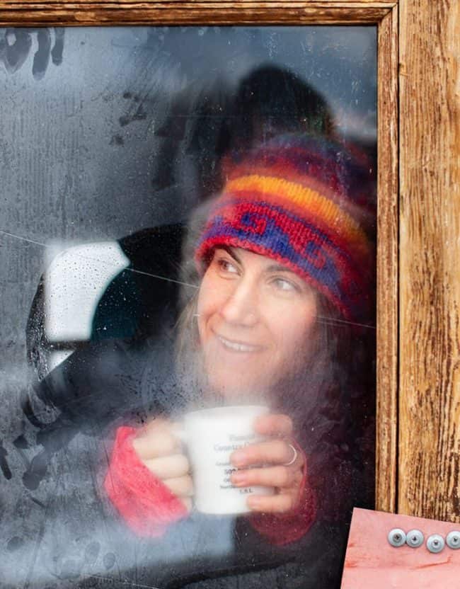 Savoring coffee, peering out of the yurt