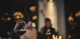 cozy hideaways wine glass and fire