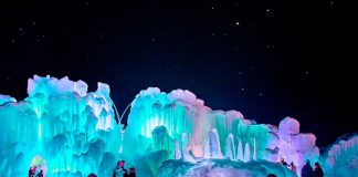 Families viewing the nearly 40-foot tall towers of Dillon Ice Castles