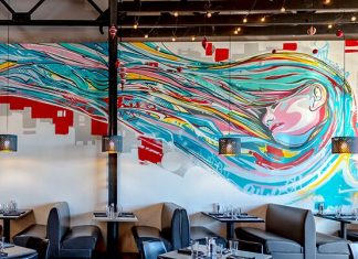 The Warrior Women of Streetcar520 Interior wall of Streetcar520, art done by Michael Ortiz. Streetcar520. Photo by John Mortland