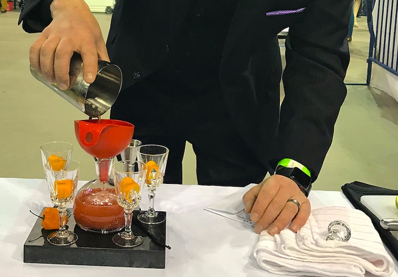 bartender pours at taste of pikes peak