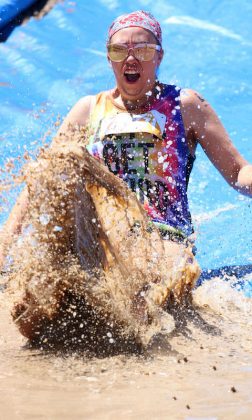 slide into mud pit obstacle course races