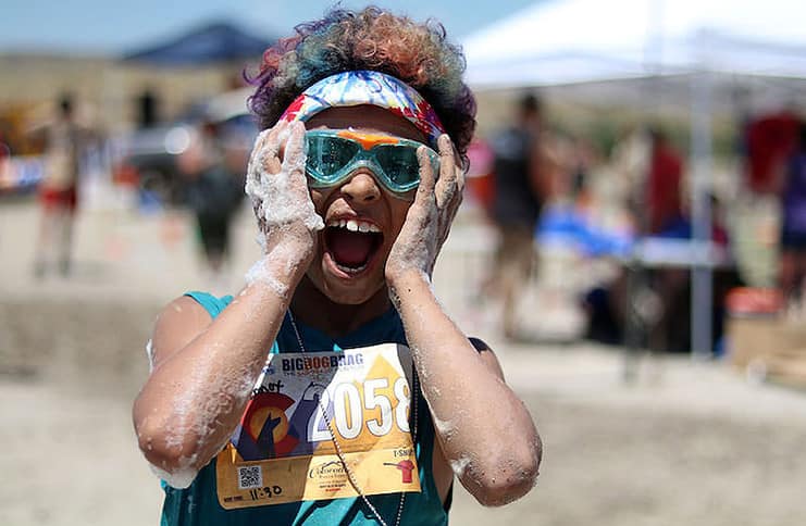 More the Muddier: Runners get down and dirty in the Big Dog Brag race.