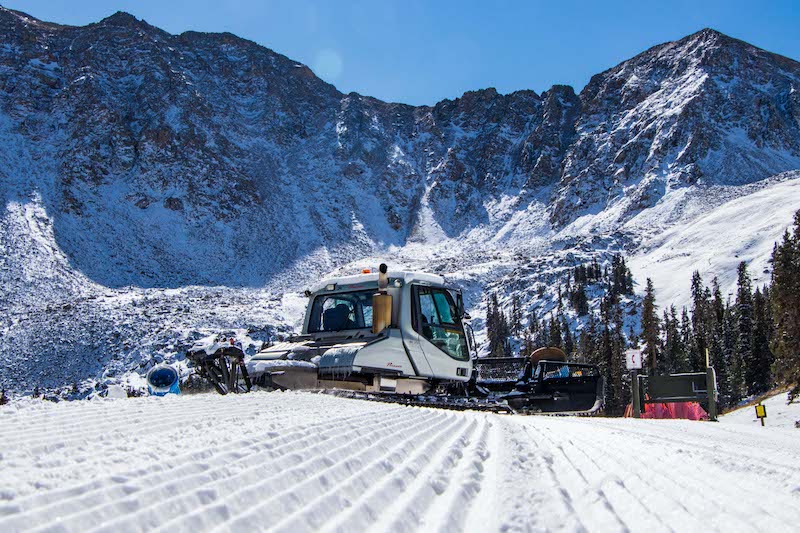 ski season opens at arapahoe basin, snowcat and corduroy