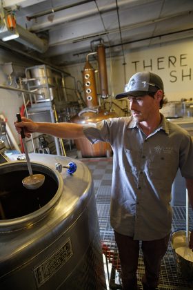 Sam Poirier preps yeast at Laws Whiskey House