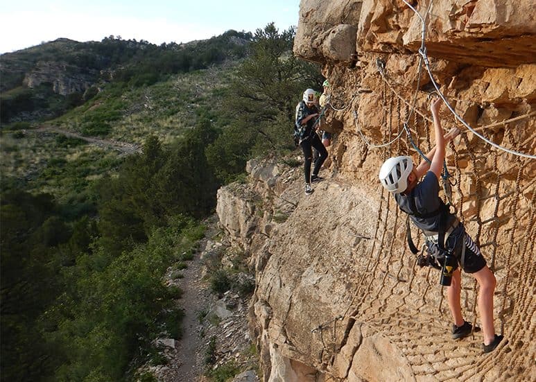 crossing the Cave of the Winds via ferrata cargo net