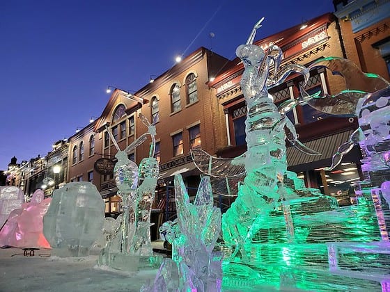 Snice Carvings' giant ice bugs line Bennett Avenue at the Cripple Creek Ice Festival, one of the best things to do this weekend in Colorado Springs.