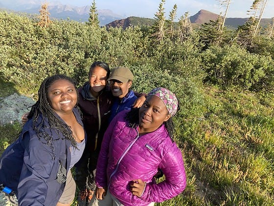 Patricia Cameron taking a selfie with some new backpackers as she takes on hiking the Colorado Trail