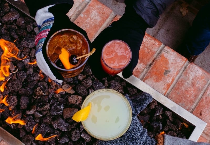 Cocktails by the outdoor fire at local restaurants in Colorado Springs