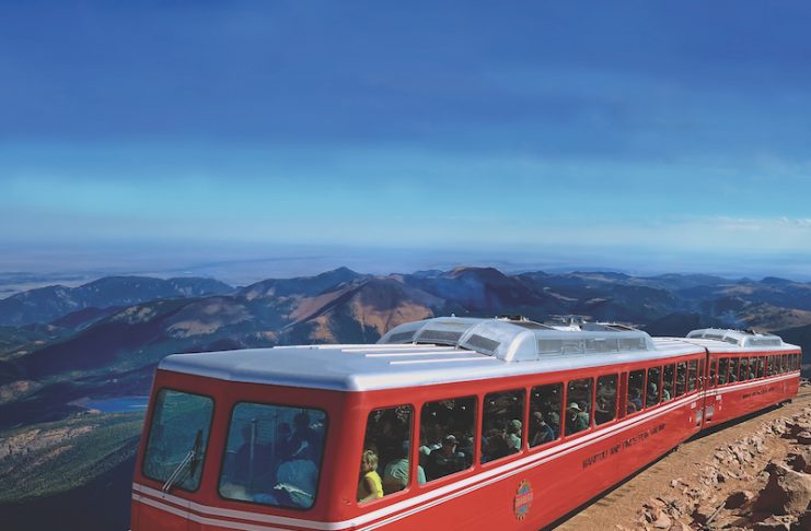 The Broadmoor, Manitou & Pikes Peak Cog Railway train on Pikes Peak. The iconic railway reopens in May, 2021.