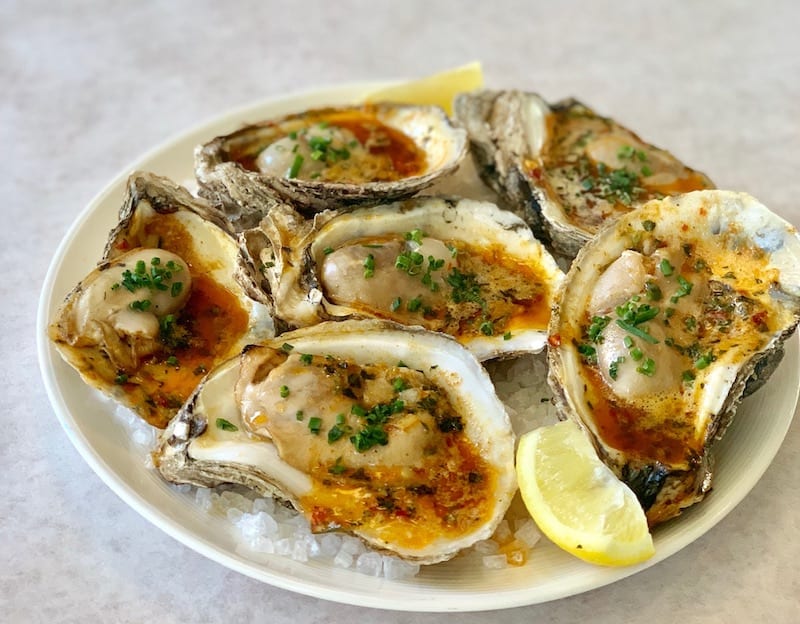 Nola style chargrilled oysters at Jax Fish House