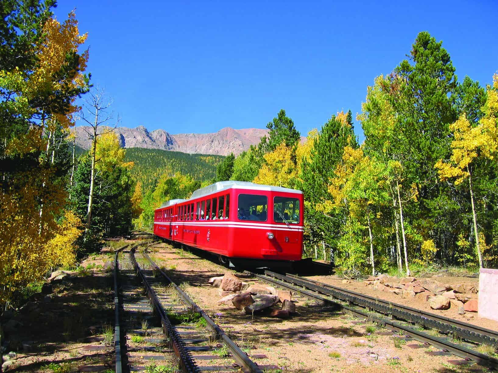 Cog Railway making its ascent among rich greenery.