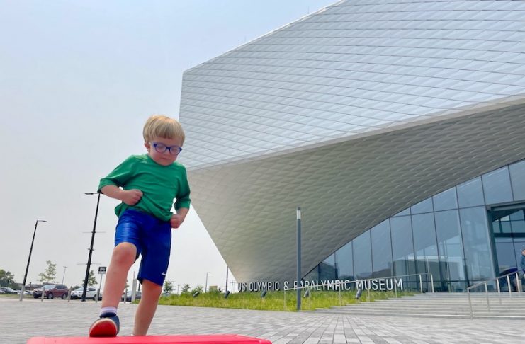 Kid runs during sport demonstration at US Olympic & Paralympic Museum, Colorado Springs