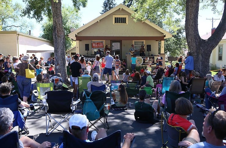 Porchfest crowd enjoying some live music at the block party