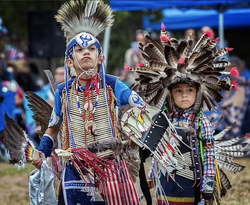 Native American kids in regalia at the Rock Ledge Ranch Powwow, one of the best things to do this weekend in Colorado Springs.