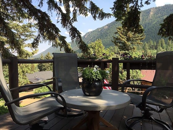 Outdoor seating on the cabin's deck.