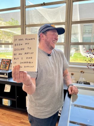 Arley Torsone enjoys the gifts in the Ladyfingers Letterpress gift shop.