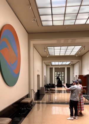 Art lines the hallways of the Fine Arts Center.