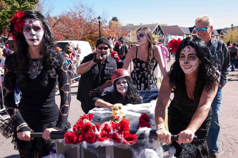 Team of coffin races at the Emma Crawford Coffin Races, one of the best things to do in Colorado Springs this weekend.
