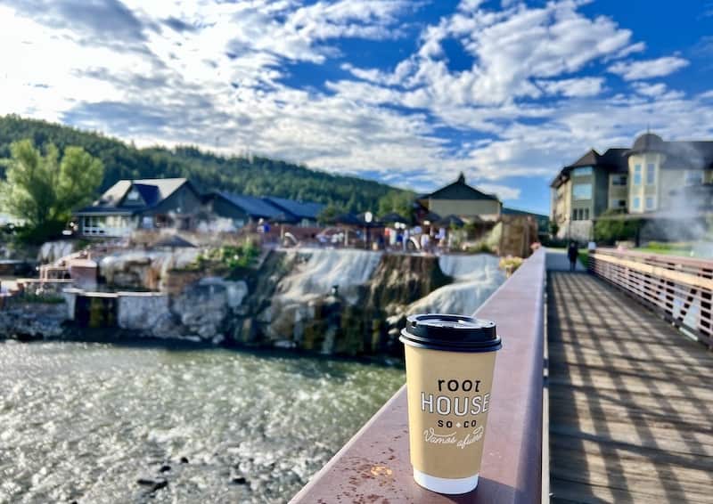 Root House coffee cup on bridge rail in Pagosa Springs, Colorado