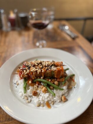 Kabobs on a bed of rice at Adam's Mountain Cafe