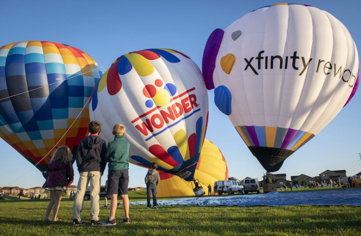 Kids watch hot air balloons rise at Aloft at Banning Lewis Ranch
