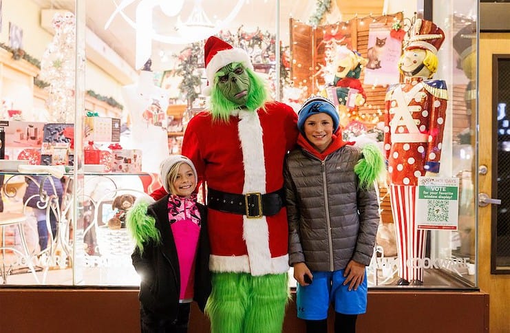 The Grinch and kids pose and add fun to holidays downtown in Colorado Springs
