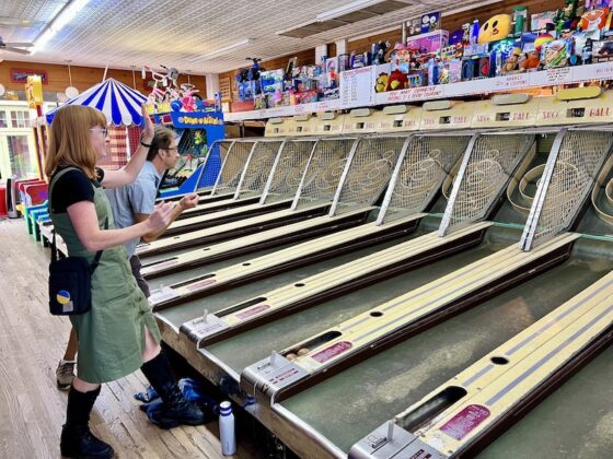 Couple plays See-Ball at the Manitou Springs Penny Arcade