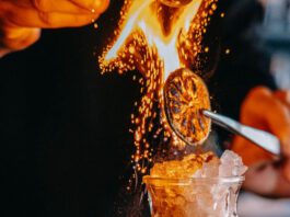 Warm Up With These Winter Cocktails Lime wedge and cinnamon burn above a Korean Zombie, a winter cocktail at 503W in Colorado Springs.