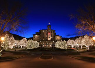 Luxury, History and Adventure in Colorado Springs Millions of white lights illuminate the front of The Broadmoor for the holidays, a perfect place to stay for the holidays or anytime for a Creative Stay in Colorado Springs