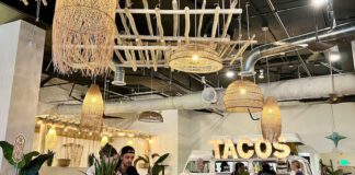 Interior of Zocalos restaurant in Colorado Springs, including the VW bus with Tacos sign