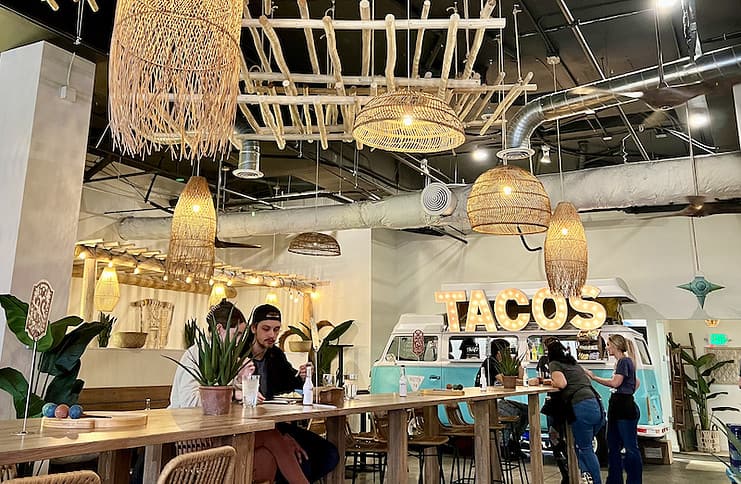 Interior of Zocalos restaurant in Colorado Springs, including the VW bus with Tacos sign