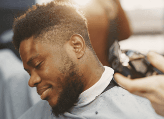 Art of Fadez Barbershop Man getting his hair done at an art of fadez barbershop