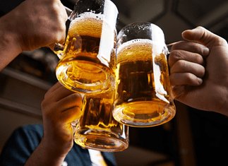 WestFax Brewing Toasting with beer mugs