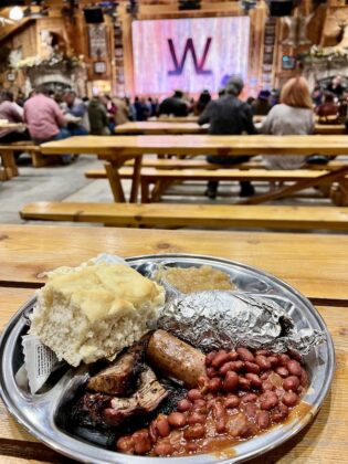 Barbecue, beans, biscuits and a full plate at a Flying W Ranch Churckwagon Supper.