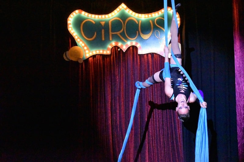 An aerialist performs on silks in Circus of the Night at the Millibo Art Theater in Colorado Springs.
