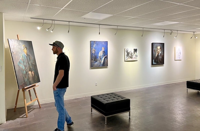 Colin Christie explores an exhibit at the Cottonwood Center for the Arts in Colorado Springs.
