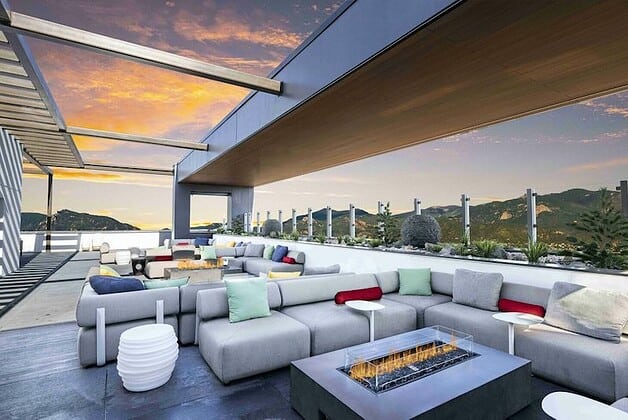 The stylish rooftop patio at Lumen8 Rooftop Social on top of the Element by Westin in downtown Colorado Springs.