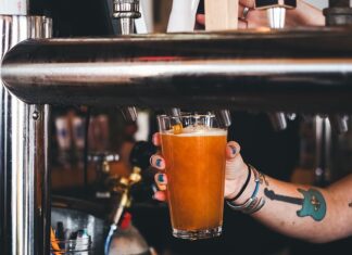 JAKs Brewing Old Ranch Beer being poured from the tap like at JAKs Brewing.