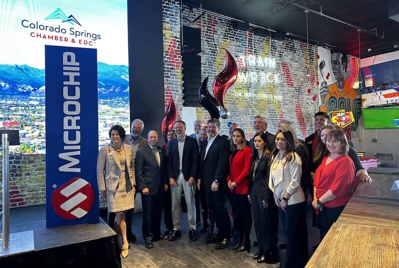 Johnna Reeder Kleymeyer, Mayor John Suthers and the teams from Microchip and the Colorado Springs Chamber & EDC celebrate Microchip's expansion and large capital investment into their Colorado Springs location. 