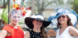 Three women in fancy hats for Axe and the Oak's annual Kentucky Derby Party, one of the best things to do this weekend in Colorado Springs
